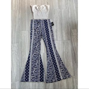 White tube top with flare bell bottom pants